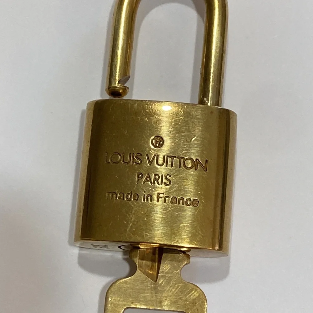 #316 LV lock key March 16 Louis Vuitton gold tone brass Anniversary Birthday